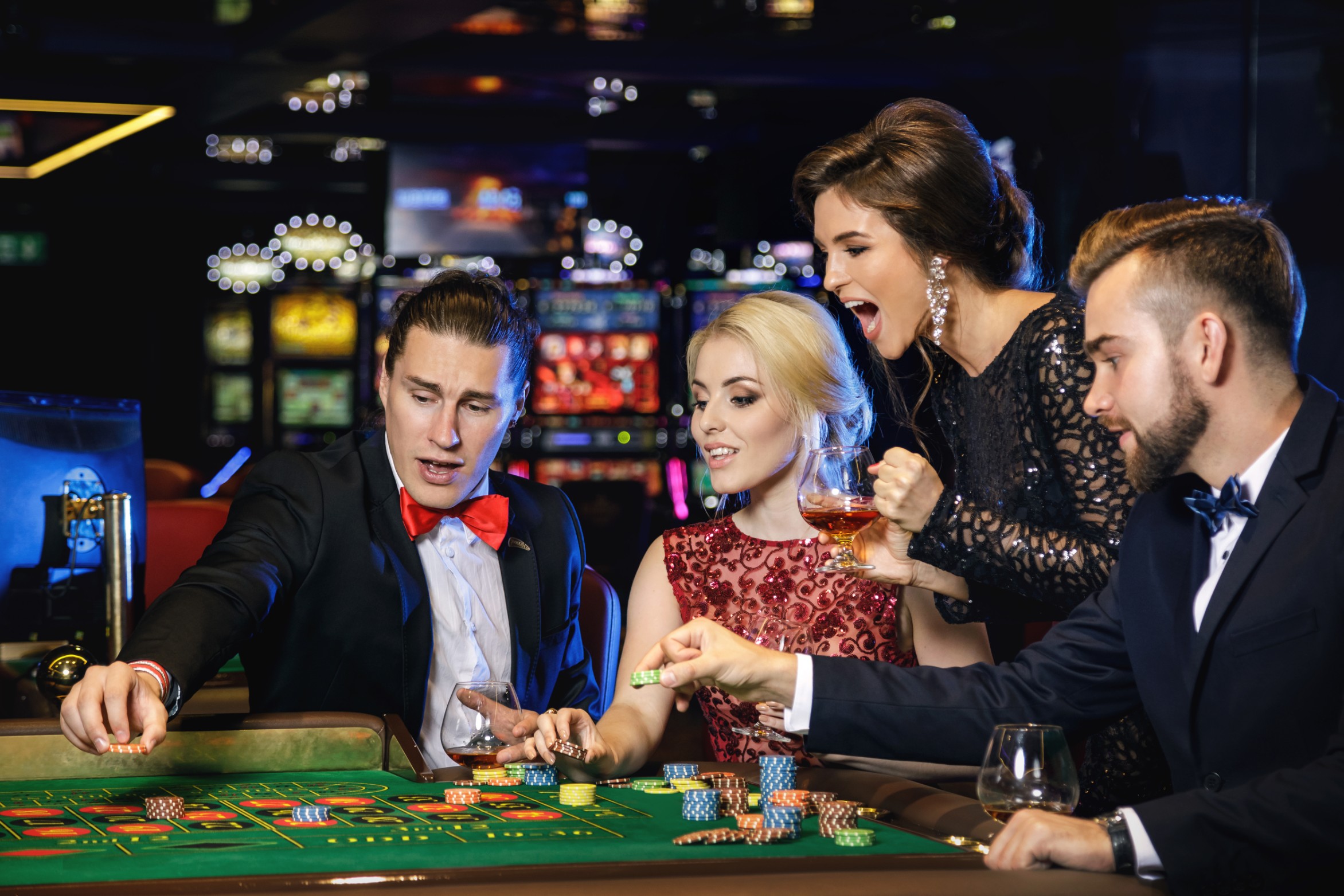 People Playing Blackjack in a casino